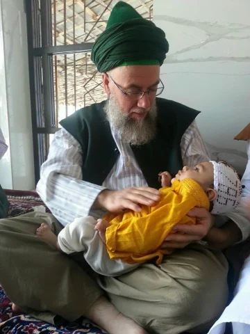 Shaykh Muḥammad ᶜᾹdil mit Baby